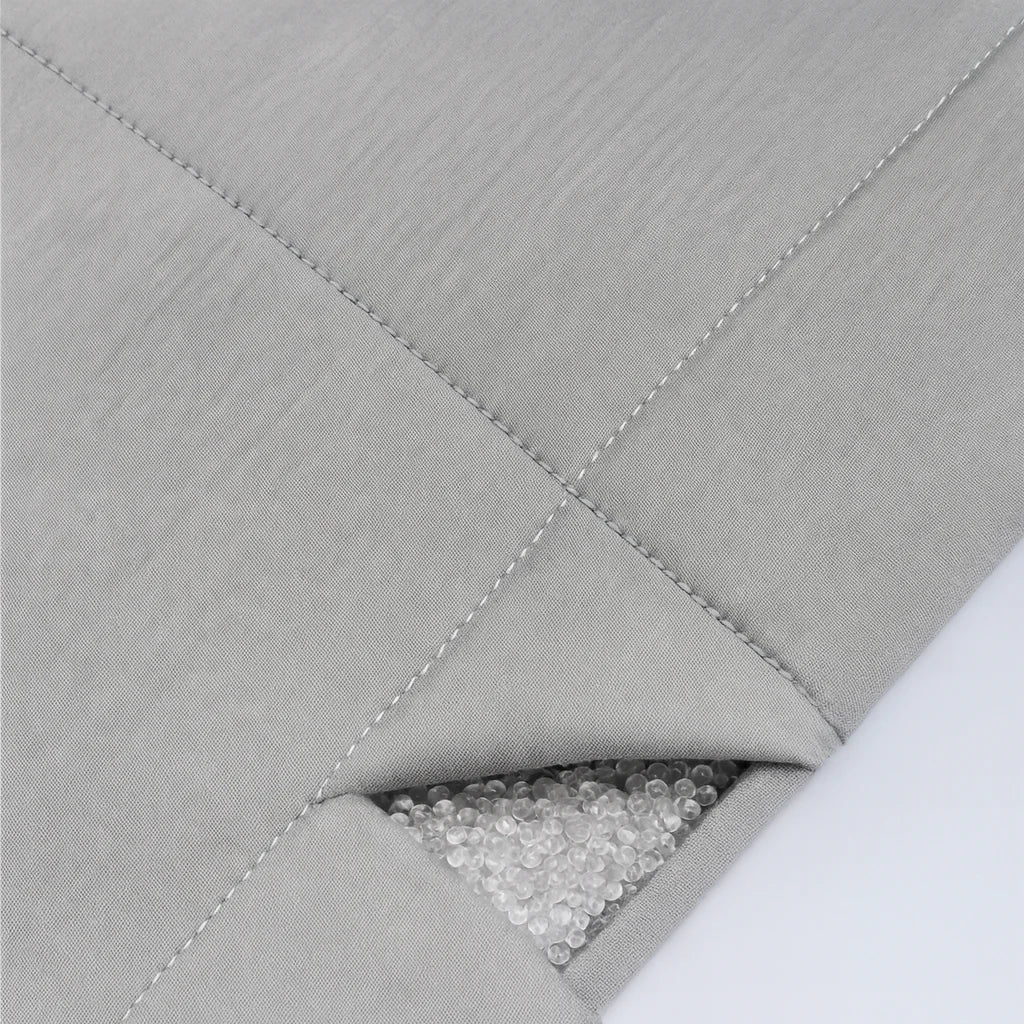 Compartiments cousus et billes de verre de la couverture lestée
