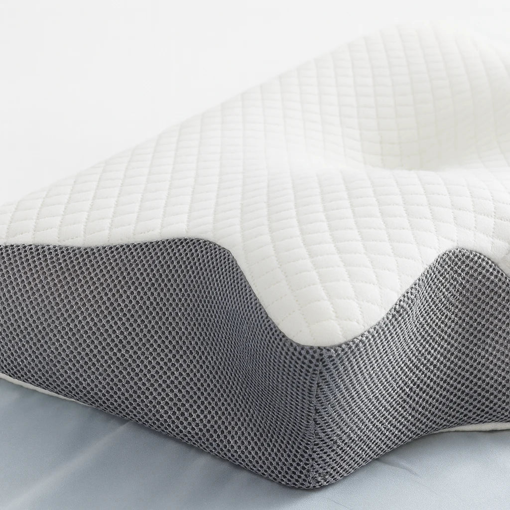 Détail matelassé et maille 3D de l'oreiller papillon blanc